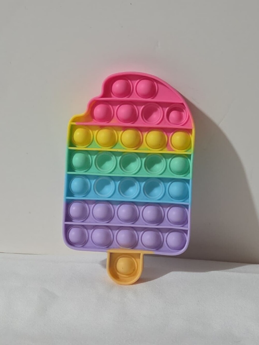 popcicle shaped rainbow pop-it fidget toy
